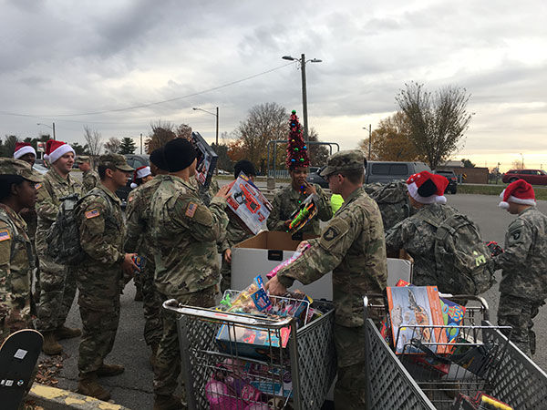 1ST BRIGADE COMBAT TEAM: Sapper Eagles ruck toys to Operation Homefront